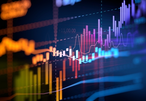 Stock Exchange screen showing sharp variations in display charts with many colours